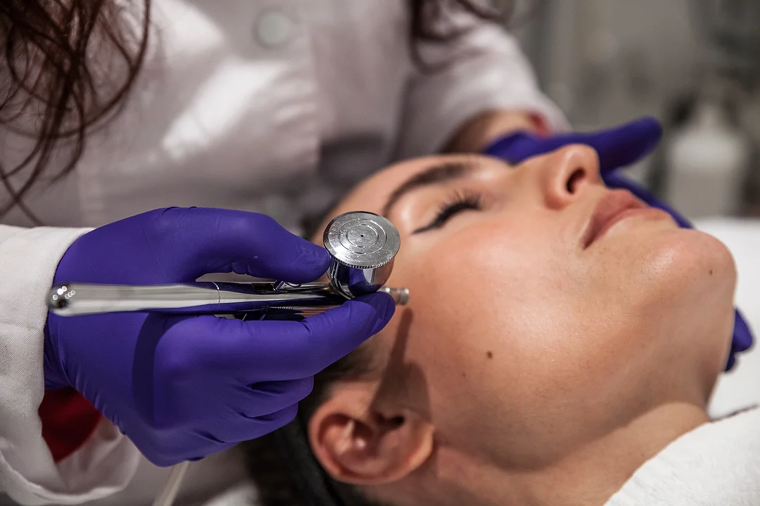 Dr Hala performing SkinPen microneedling treatment in Fulham clinic